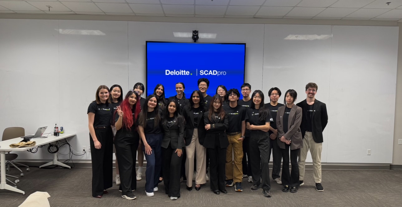 Fig. 04 — Final presentation. All nineteen, with Deloitte on the screen