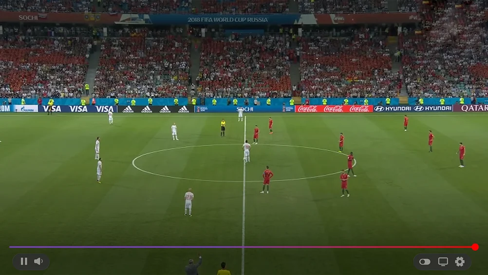 Fig. 10 — Inside the event: the tactical view from above the pitch · live captions and translation, with the broadcast picture-in-picture